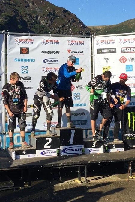 Lewis Boyce on the podium